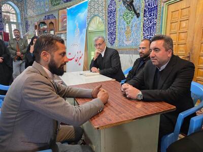  میز خدمت رئیس سازمان ثبت اسناد و املاک کشور در مسجد جامع شهرستان فراهان